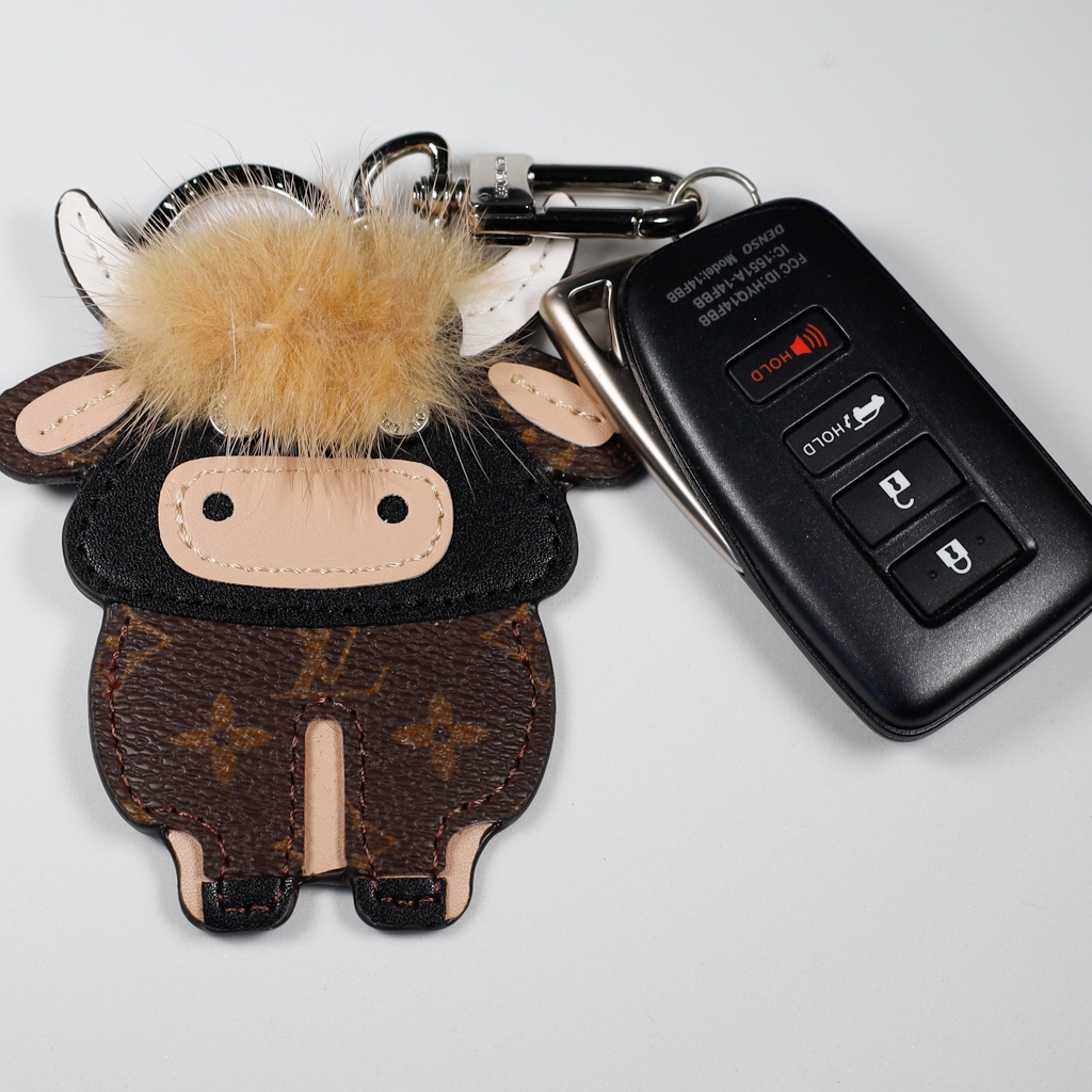 lv highland cow keychain