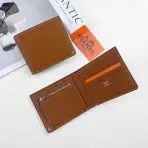 Hermes Bi-Fold Wallet—Black—Golden Brown